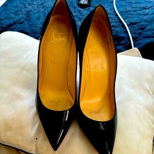 Authentic Pair of Christin Loubotins Pigalle Pumps